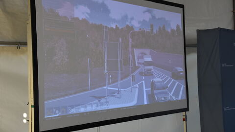 Eröffnung Infocenter OU Mörlenbach 18 Die 3D-Echzeitsimulation wird auf einer Leinwand im Zelt gezeigt